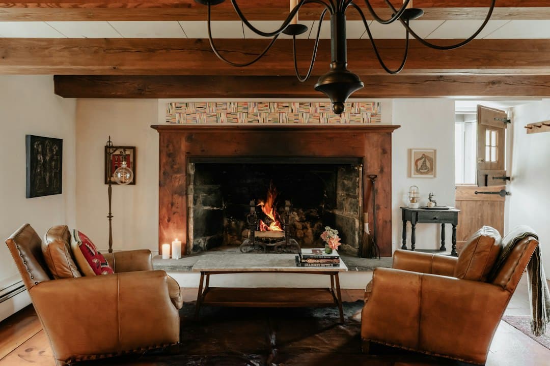Warm rustic farmhouse living room with neutral paint and natural wood